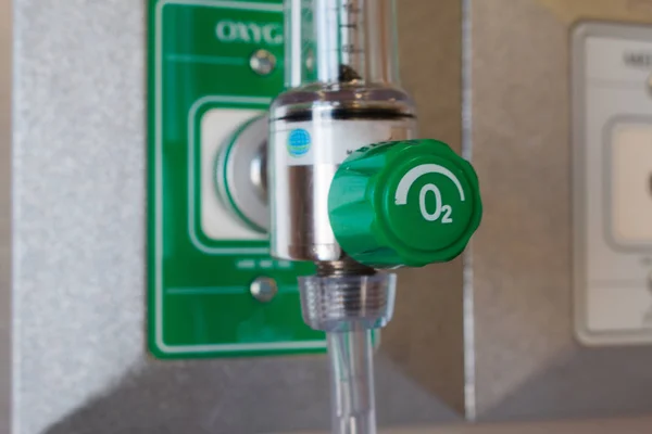 medical oxygen,Close-up image of a medical oxygen mask and valve setting blurry on wall