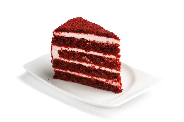 A piece of red velvete cake on isolated white background — Stock Photo, Image