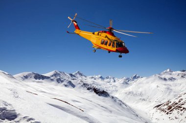 helicopter in the high mountains clipart