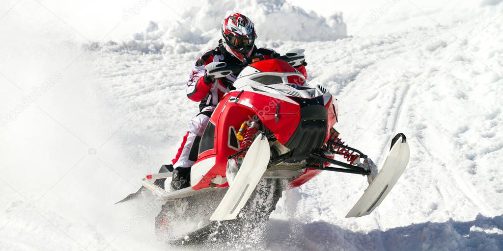 jump with snowmobile in winter landscape