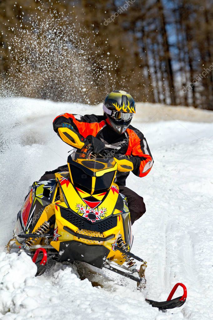 soaring with snowmobile in fresh snow