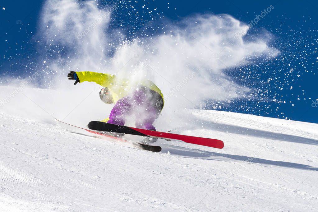 fall on skis in fresh snow