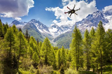aerial shots with drone in the mountains clipart