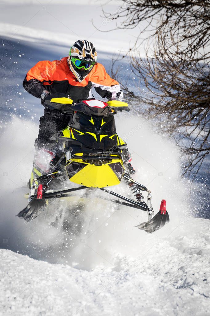 winter sport - Snowmobile in action 