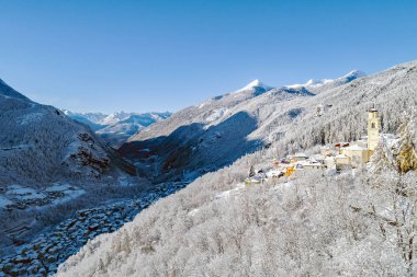 Primolo - Valmalenco (IT) - Aerial winter view with fresh snow clipart