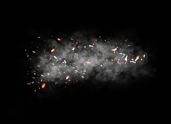 Fire particle . Embers debris on isolated black background. Smoke on background texture.