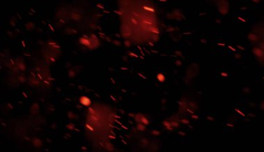 Renkli uçan kadar kıvılcım. Bulanıklık parçacıklar köz üzerinde koyu arka plan doku bindirmeleri parlayan