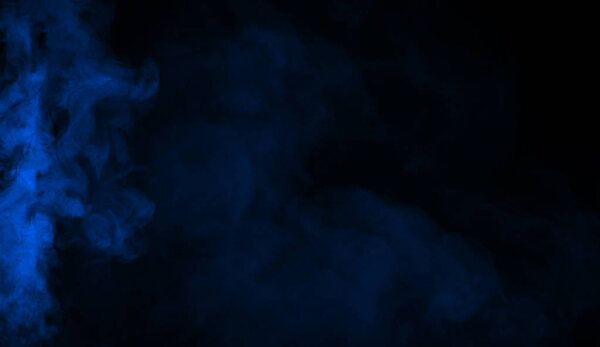 Abstract blue smoke mist fog on a black background. Texture background for graphic and web design.