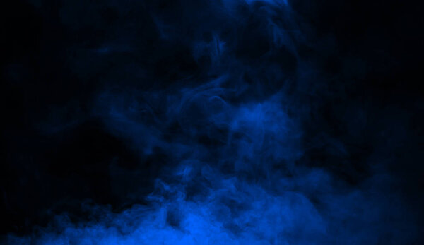 Abstract blue smoke mist fog on a black background. Texture background for graphic and web design.