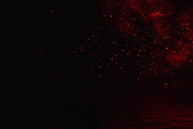 Parçacıklar köz yansıması su ile ateş. Afiş, el ilanı, kart için tasarım dokusu.