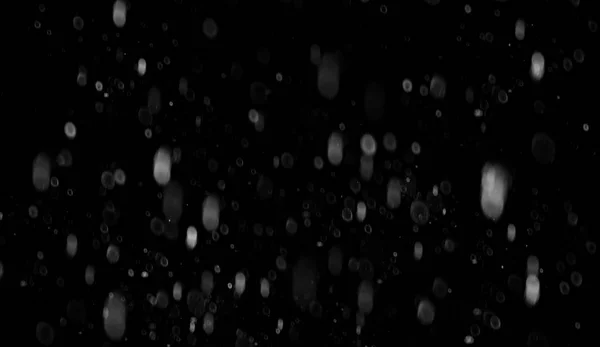 第一次落雪波克纹理在黑色的背景。冬季质感. — 图库照片