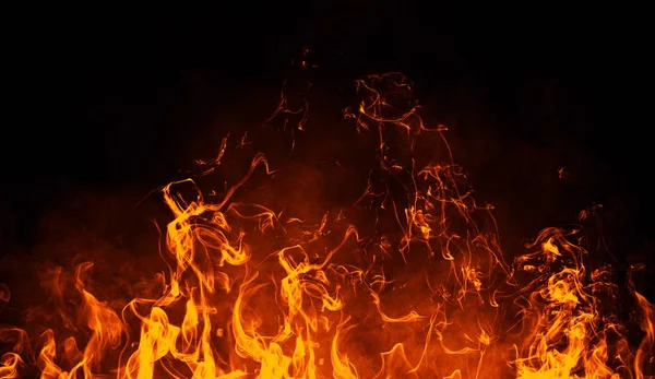 Feuerflammen Textur auf isoliertem schwarzen Hintergrund. perfekte Textur für Kopierraum — Stockfoto