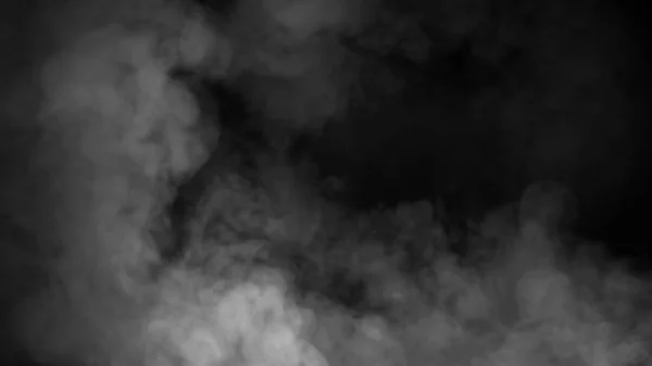 Vapor de humo desenfocado sobre fondo negro aislado. Textura brumosa — Foto de Stock