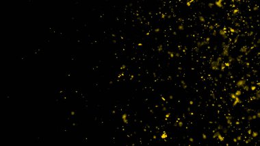 Sarı parçacıklar toz kalıntılarını siyah zemin üzerinde izole eder. Koyu dokuda hareket pudrası patlaması olur.