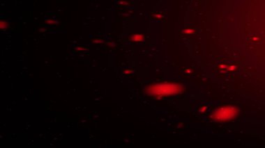 Uçan kırmızı ateş parçacık dokusunu kaplar. İzole edilmiş siyah arkaplanda yanık enkazı etkisi.