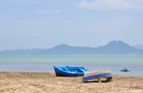 View on the empty beach with boats in Tunisia — Stock Photo, Image