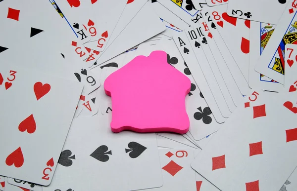 picture of playing cards and house