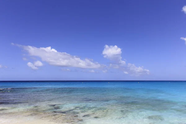 Ocean coast with white sandy coast and turquoise colorful waters