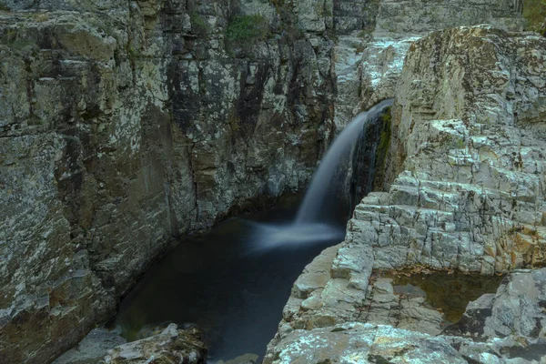 waterfall between rocks, waterfalls and cascades between rocks