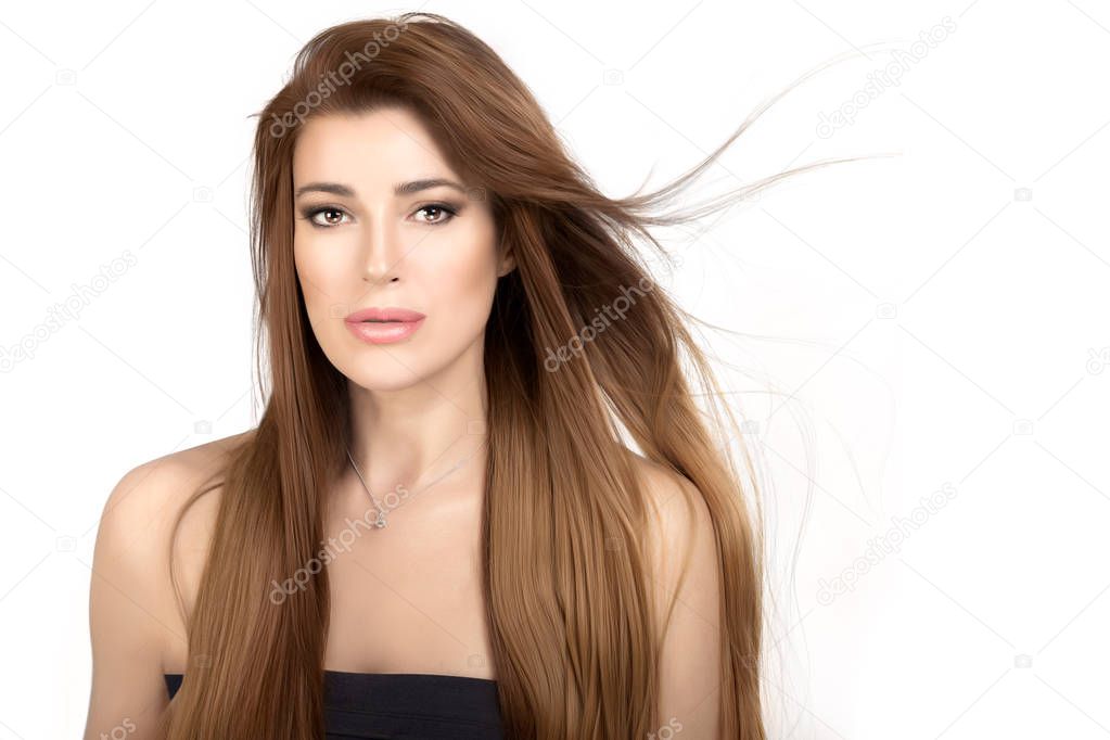 Beautiful model girl with healthy long hair. Keratin smoothing treatment. Care and hair style products