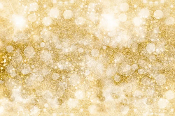 Golden glittering pattern. Festive background. Shimmering sparkl — Stock Photo, Image