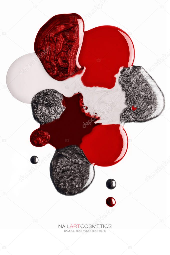 Abstract design of red and silver nail polish