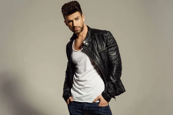 Sexy Male Model Wearing Leather Jacket Isolated Grey Background — Stock Photo, Image