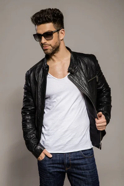 Handsome man in leather jacket wear sunglasses