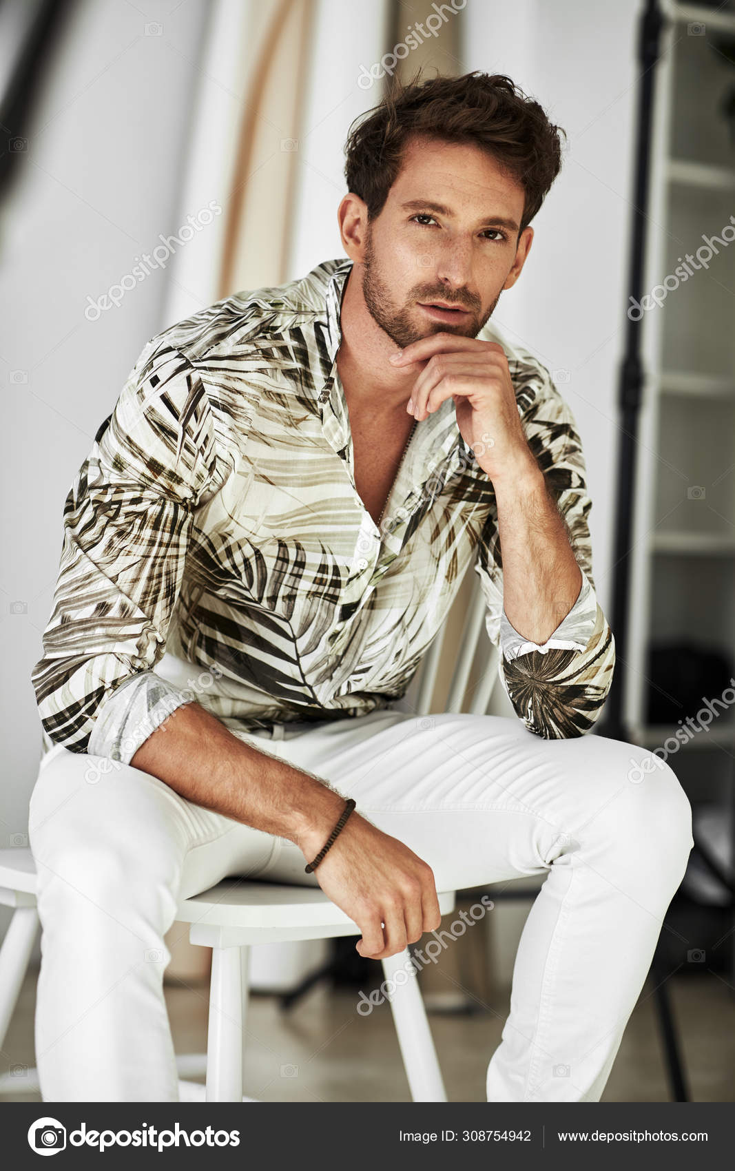 Handsome Man Sitting Chair Summer Outfit Stock Photo by ©kiuikson 308754942