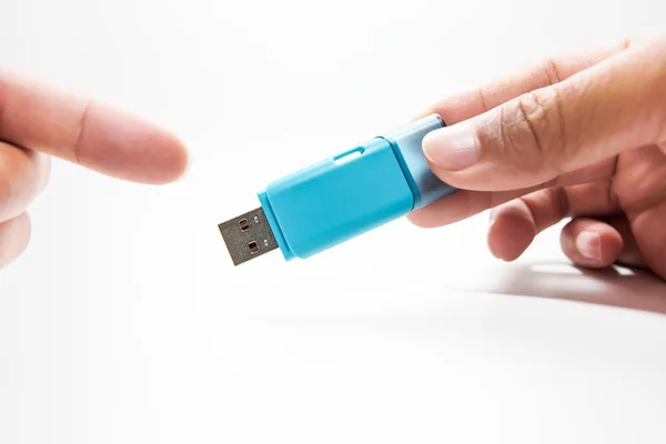 Flash drive in hand isolated on white background. — Stock Photo, Image