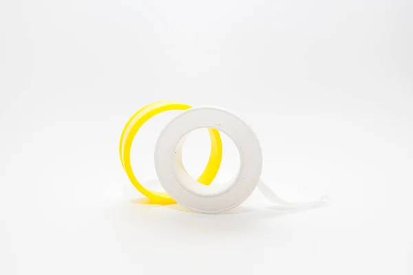 Sealing tape for threaded connections on white background