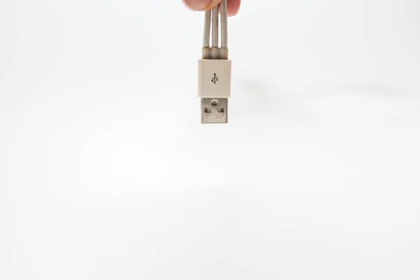 Alte drei-Wege-USB-Handy-Ladekabel isoliert auf weiß — Stockfoto