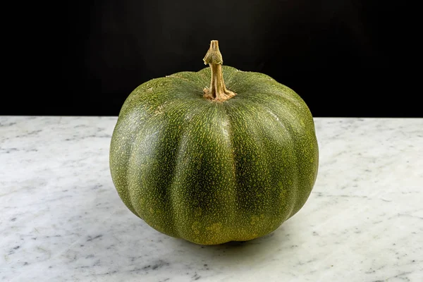 Pumpkin, ripe seasonal fruit on the table — Stock Photo, Image