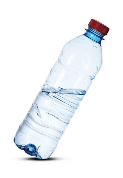 Plastikowa mała butelka pochylona — Zdjęcie stockowe