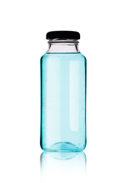 液体付き小さなガラス瓶 — ストック写真