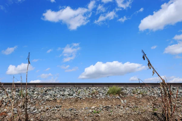 Railway with sky and clouds