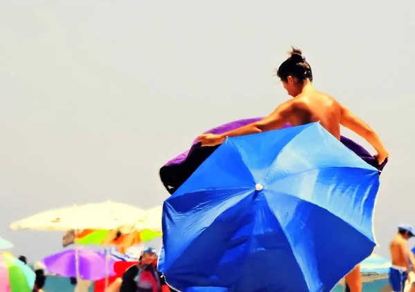 Woman Beach Blue Umbrella Stock Picture