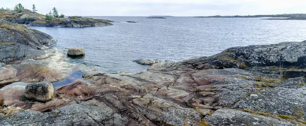 Panoramic Landscape Lake Rocky Shore Small Trees Overcast Spring Day — Stock Photo, Image