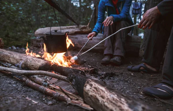 Two People Frying Marshmelow Warming Kettle Water Stake Hike Warm — Stock Photo, Image