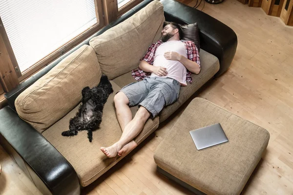 Young Man His Dog Schnauzer Amusingly Fell Asleep Soft Sofa — Stock Photo, Image