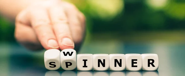 Hand Turns Dice Changes Word Spinner Winner — Stock Photo, Image