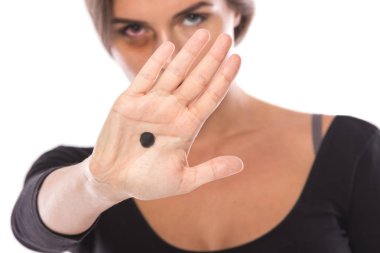 Woman with black dot on her palm give signal about domestic violence clipart