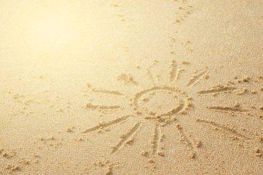 Güneş kum üzerinde çizim. Herhangi bir plaj tatil tema kavramı.