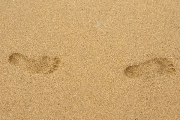 Stäng Upp Två Fotspår Sanden — Stockfoto