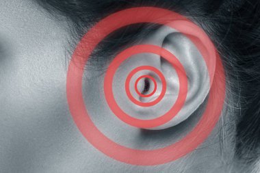 Close up view of female ear with source of pain clipart