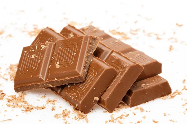 Stukken Van Melkchocolade Witte Achtergrond — Stockfoto