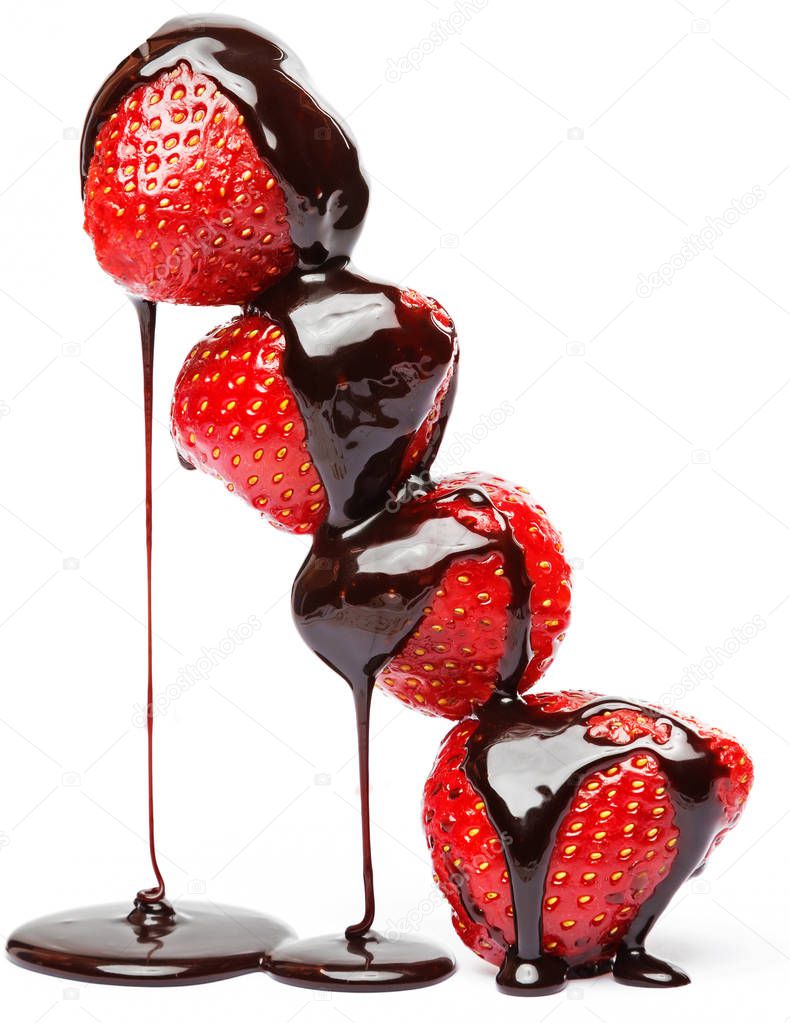 Strawberries covered with a chocolate syrup on white background
