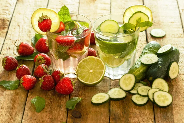 Refreshing Drink Strawberries Limes Cucumbers Wooden Table — Stock Photo, Image