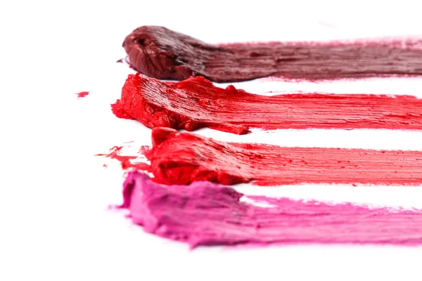 Diferentes Muestras Multicolores Lápiz Labial Manchado Sobre Fondo Blanco — Foto de Stock