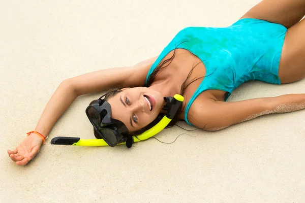 Young woman  with a mask for snorkeling. Summer and beach holidays.